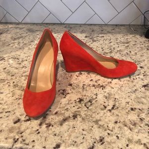 Orange wedge heels